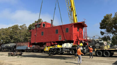 News photo: Caboose, remnant of Fillmore & Western, heads to new home