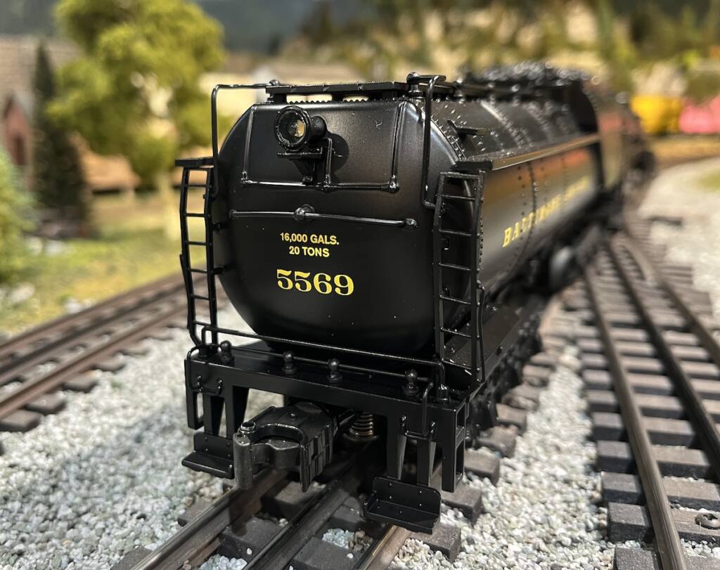 rear of tender on black model steam locomotive