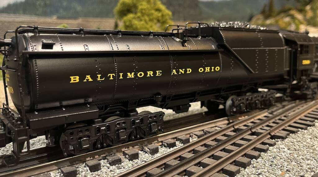 side of tender on black model steam locomotive