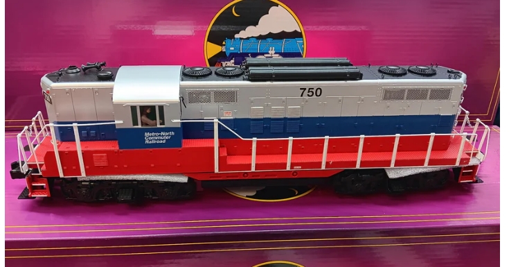red, blue, and silver model locomotive