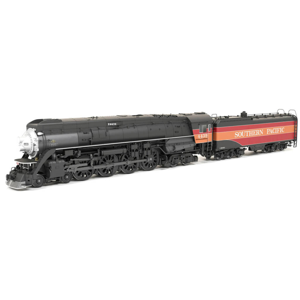 A black model steam locomotive with a black tender with and orange and red stripe on the side of the tender