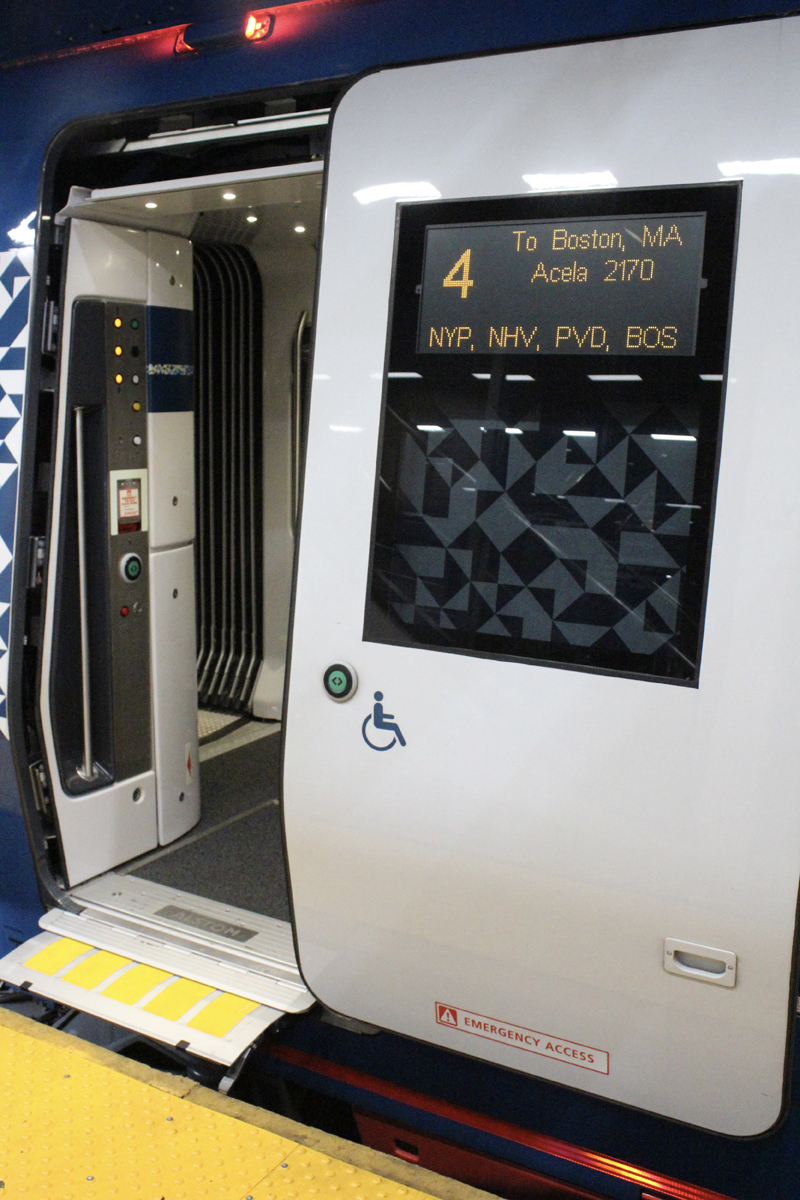 Open door on train at station