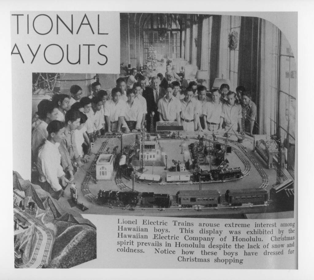 vintage magazine with boys around a train layout