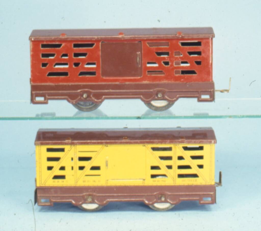 two vintage toy train cars