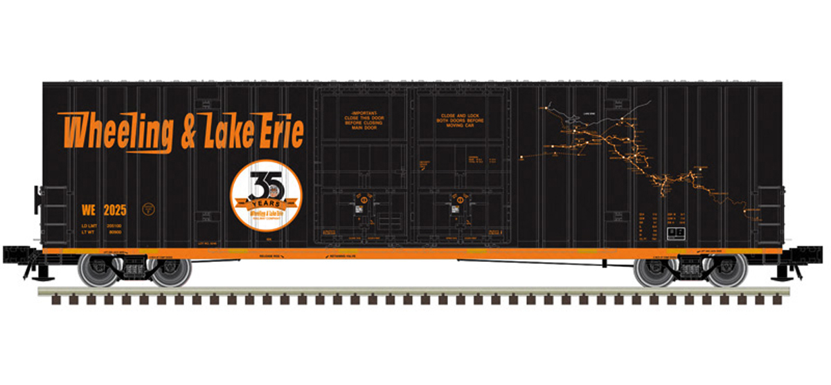 A black model boxcar with orange lettering