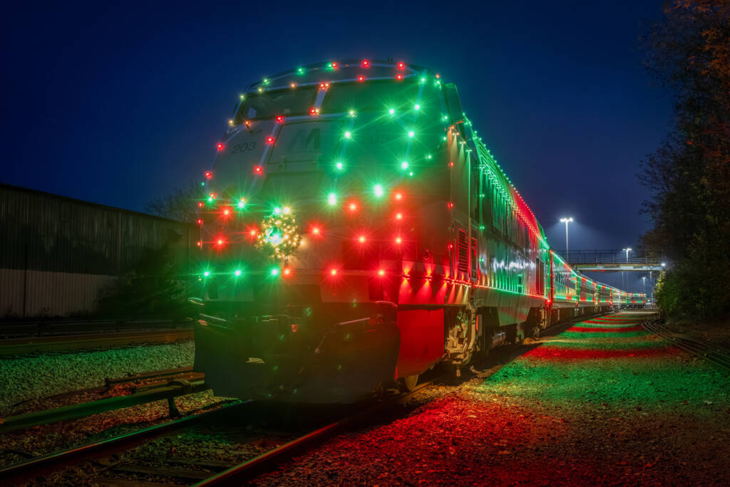 Commuter train decorated with holiday lights