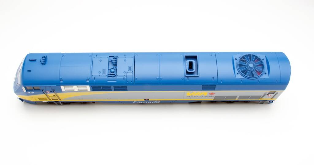 top of yellow, silver, and blue locomotive