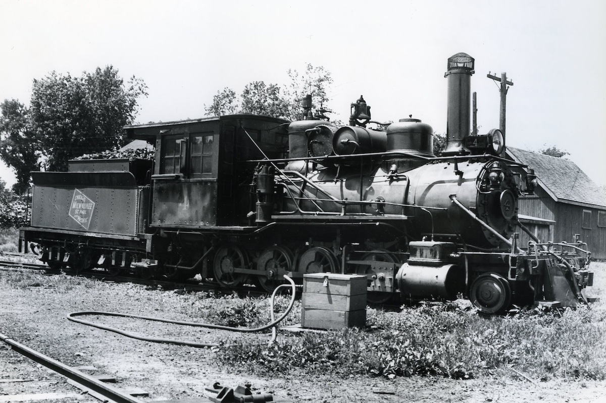 Black-and-white photo of narrow gauge steam locomotive
