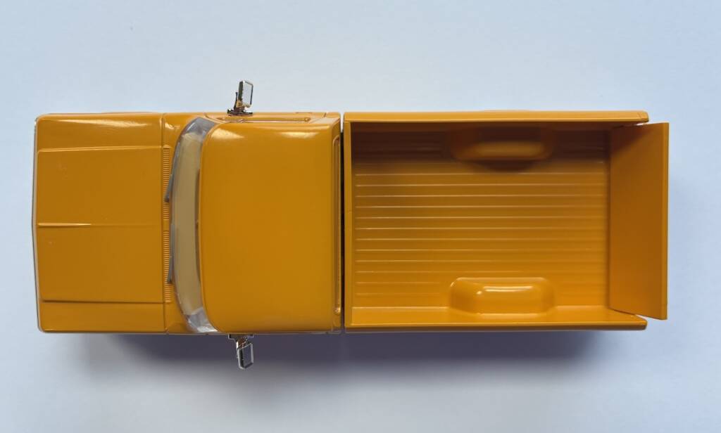 top of yellow model truck