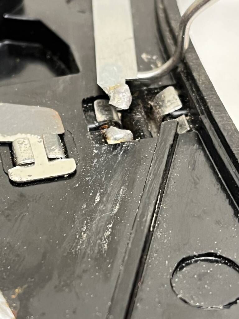 bottom of track switch with broken tab