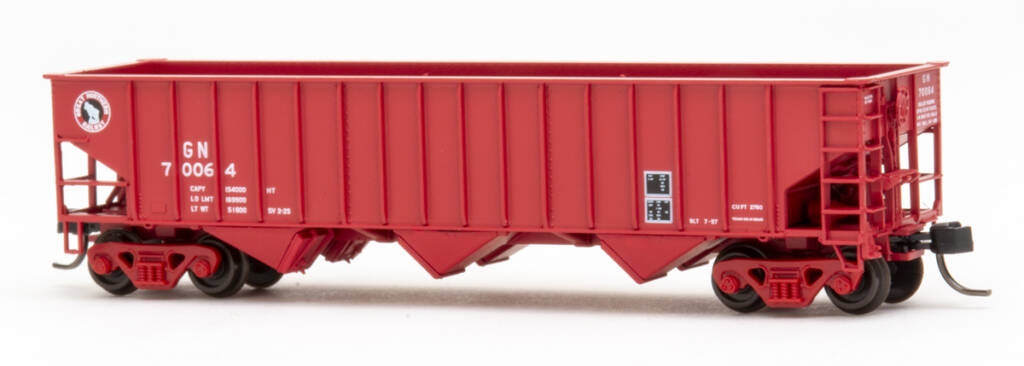 Color photo of red three-bay hopper with exterior posts with black and white graphics on white background. 
