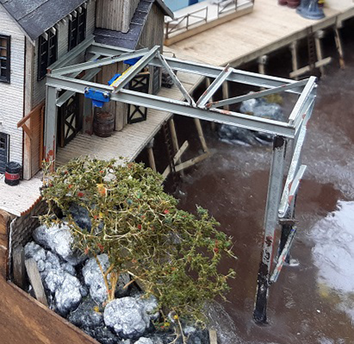 A model gantry crane on a model railroad layout