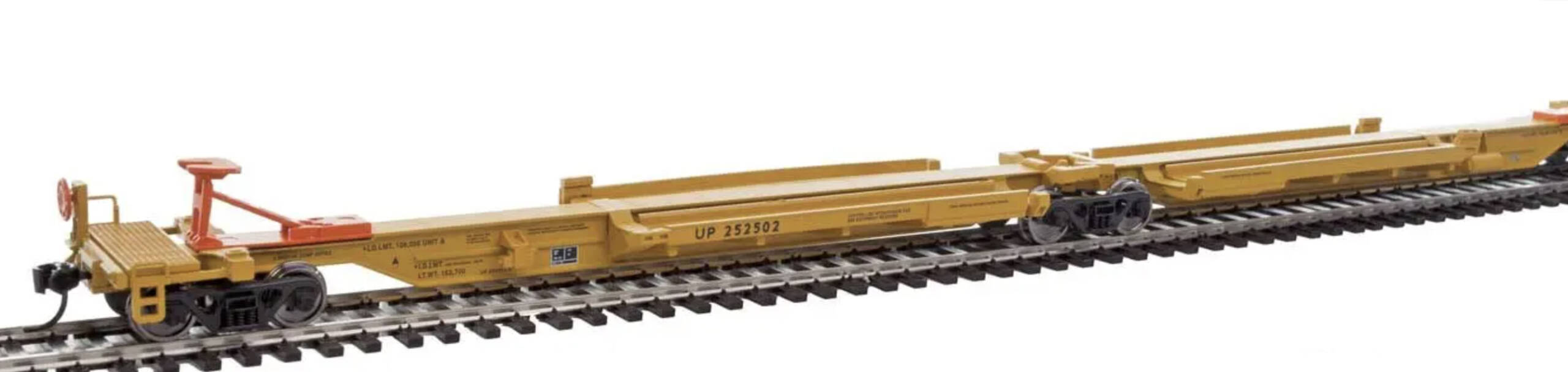 A set of yellow model spine cars