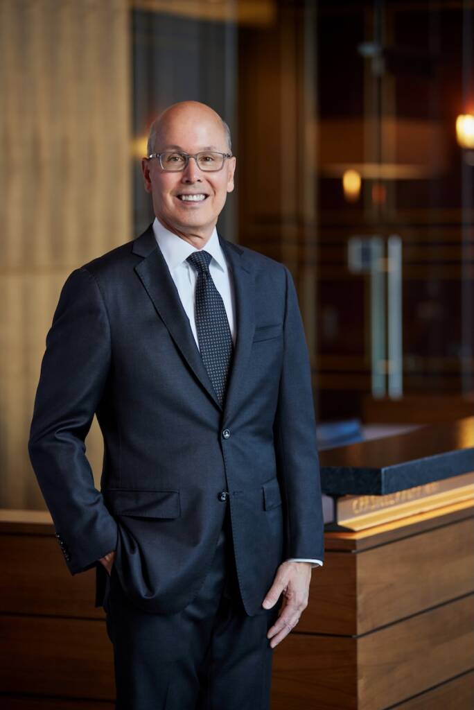 Man in suit standing in office