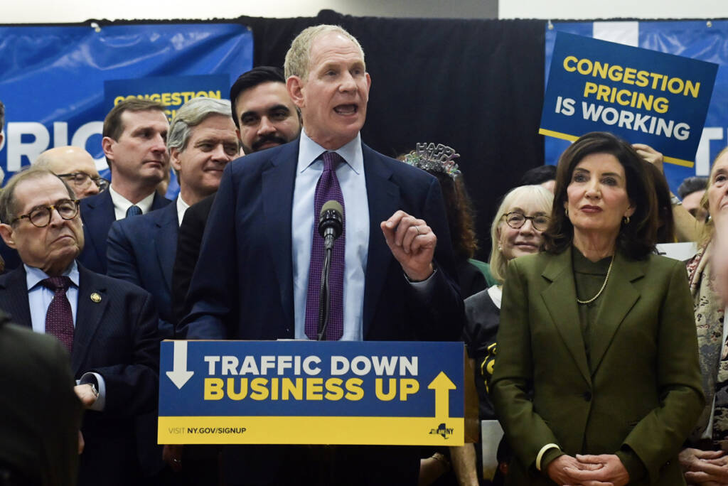 Man speaking at podium