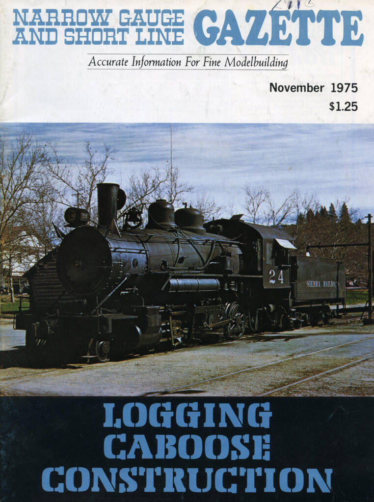 Magazine cover with color image of steam locomotive, blue text on white background above image, and blue text on black background below photo.