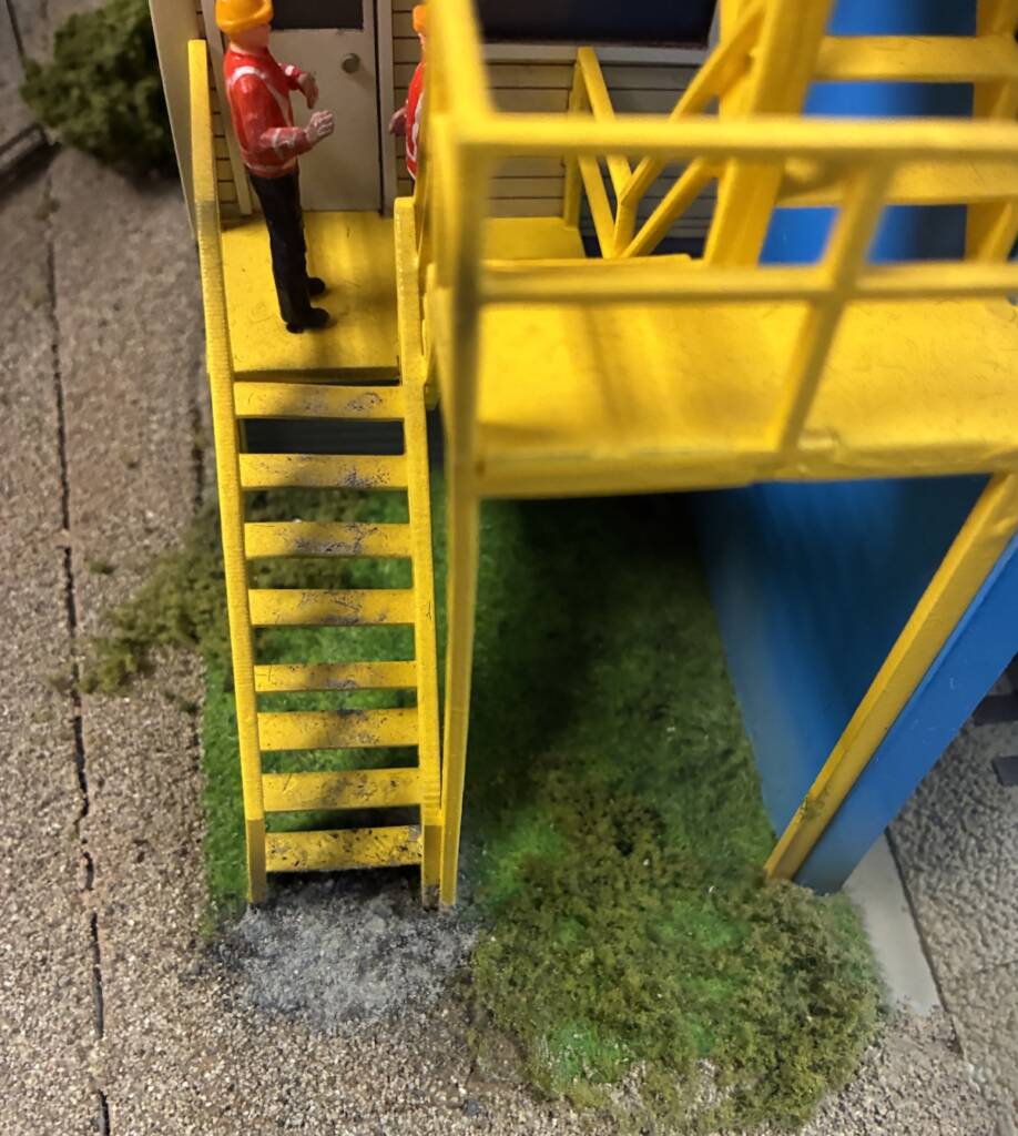 closeup of model stairs on toy train layout
