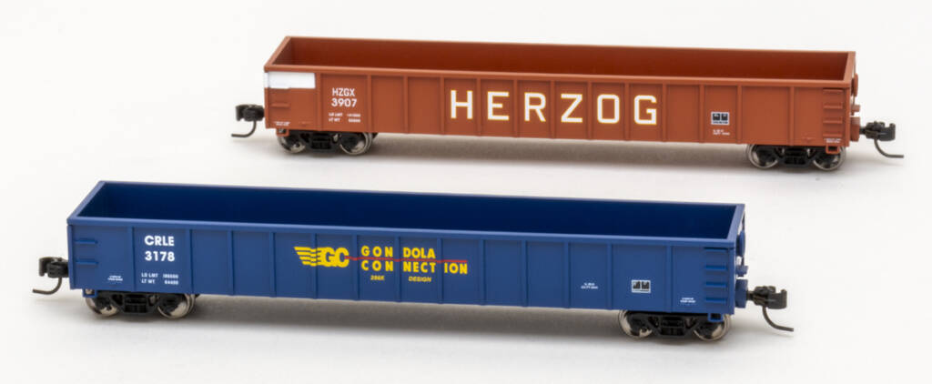 Color photo of two N scale gondolas — one blue with red with red, yellow, and white graphics and the other oxide red with white and yellow graphics — shown on white background. 