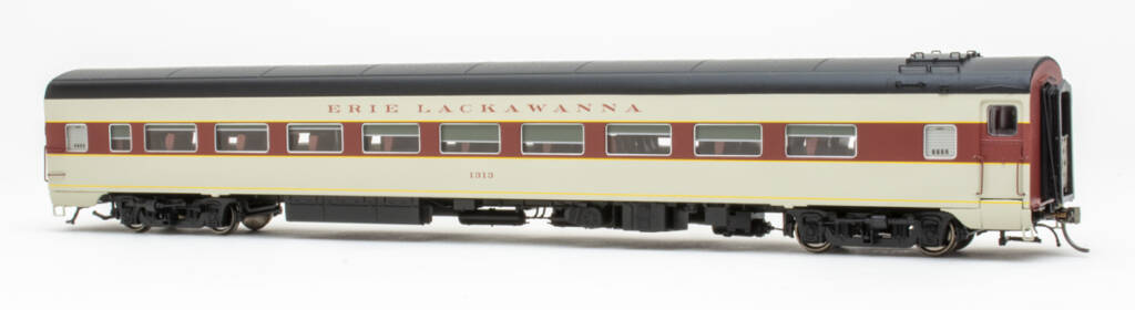 Color photo of HO scale lightweight coach painted gray, maroon, and black with yellow strips and maroon lettering on white background.