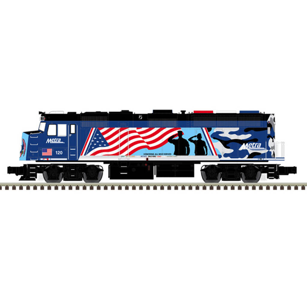 A model locomotive in a patriotic paint scheme with silhouette figures saluting the American flag