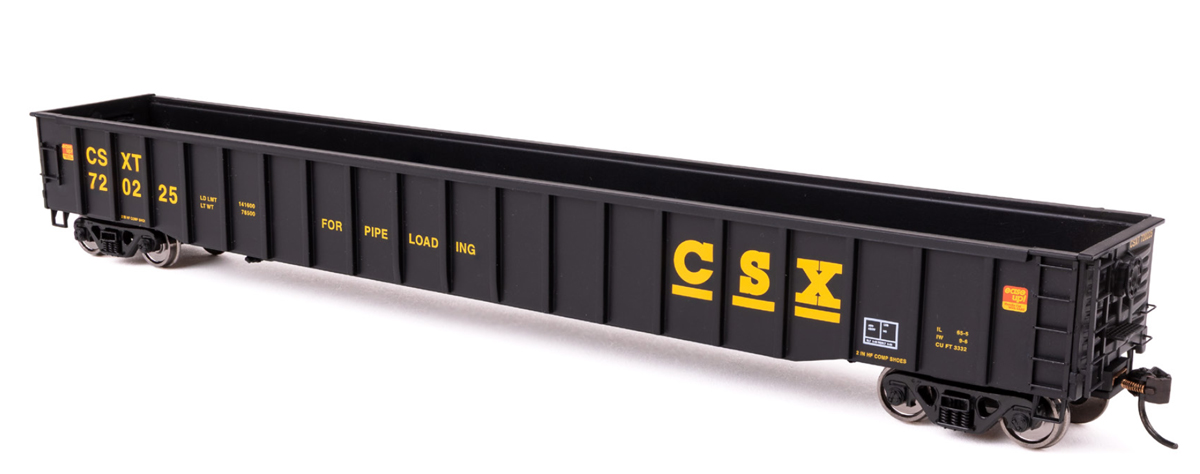 A black model gondola with yellow text that reads "CSX"