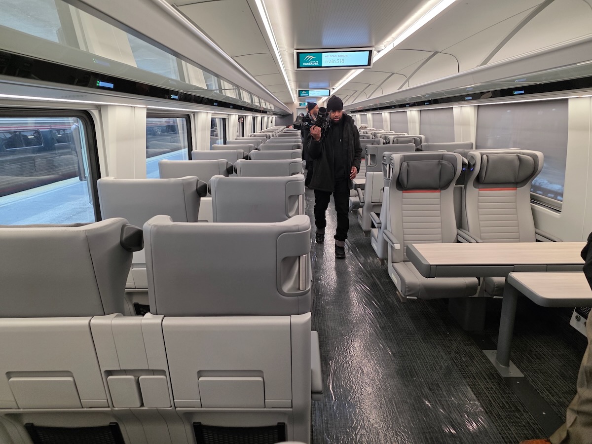 Passenger car interior with two-tone gray seats.