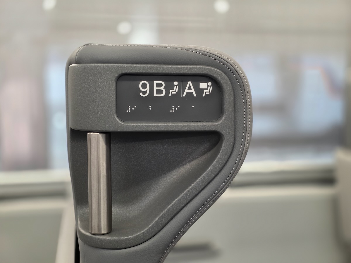 Detail of head rest on Airo car seats featuring grab handle