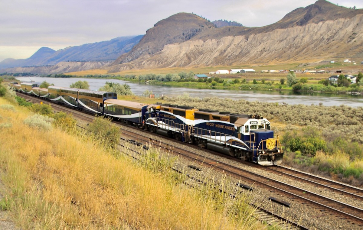 Passenger train in mountain valley 