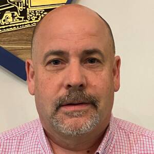 Head shot of man in office