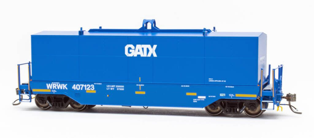Color photo of modern HO scale coil gondola with hood painted blue with white and yellow graphics and black trucks on white background. 