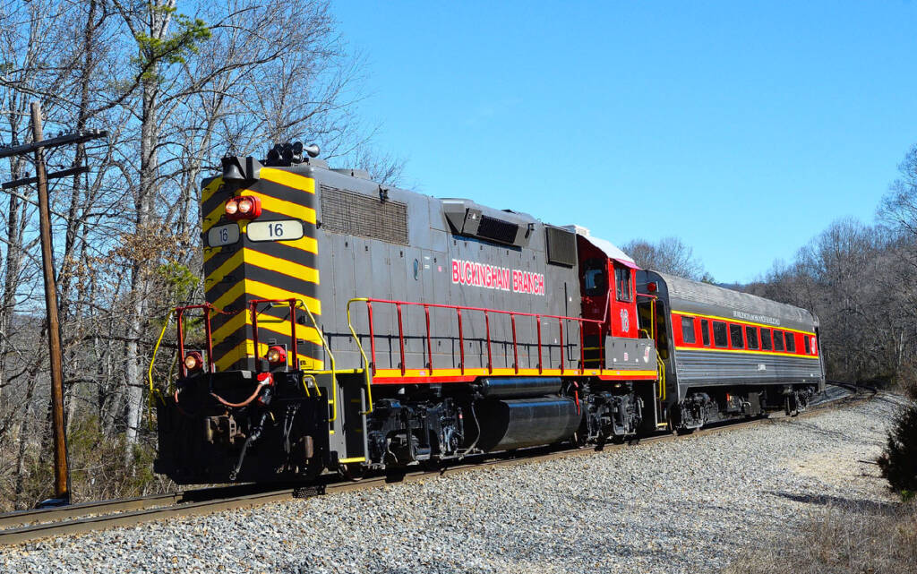 Gray and red diesel locomotive pulling a silver and red passenger car. Rare-milage excursion announced for Buckingham Branch Railroad.