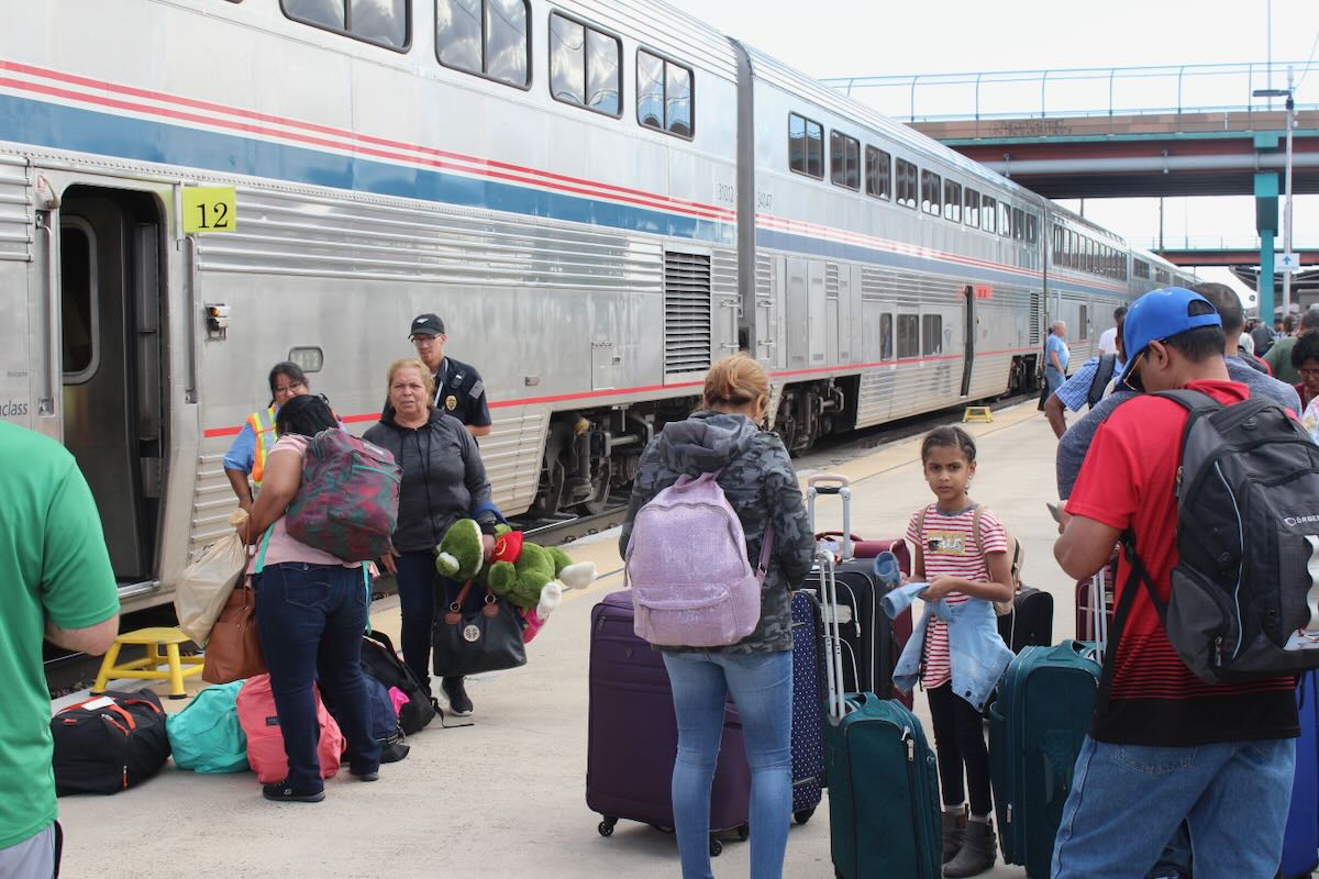 Passengers boarding train